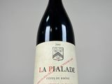 a bottle of wine that is sitting on a table