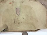 a bag with a drawing on it sitting on a table