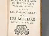 an open book with a picture of a cat on it ' s cover
