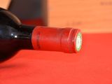 a bottle of wine that is sitting on a table