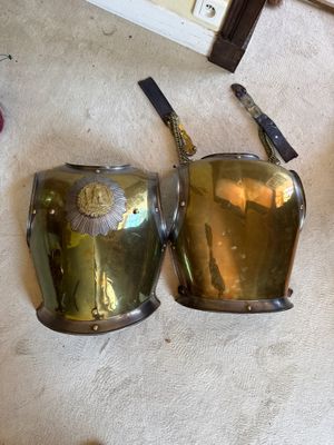two cups that are sitting next to each other on the floor