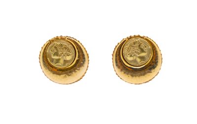pair of gold plated earrings with a roman coin in the center