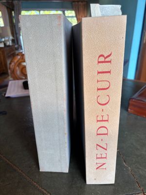 two books that are sitting on a table
