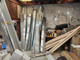 a pile of assorted metal items in a room