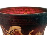 a close up of a vase with a design on it