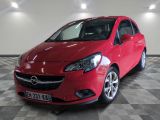 a picture of a red opel car parked in a garage