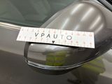 a sticker on the side mirror of a car that says vauto