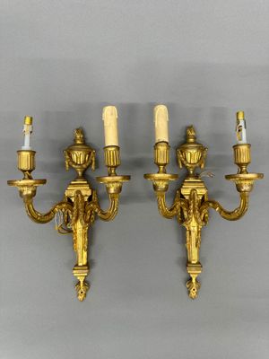 pair of antique brass wall sconces with candle holders