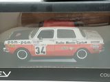 a box with a model of a race car in it