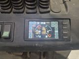a close up of a control panel on a vehicle