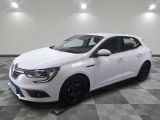 a white car is parked in a room with a checkered floor