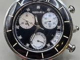 a close up of a watch on a white surface