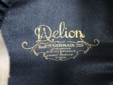 the label of a suit is shown on the back of a jacket