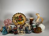 a lot of vases that are sitting on a table
