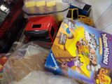a pile of toys in a plastic bag on the floor