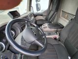 a steering wheel and dashboard of a truck