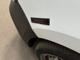 a sticker on the front of a white truck