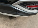 a close up of the front bumper of a car