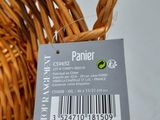 a wicker basket that has a price tag on it