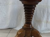 a wooden table with a clock on top of it