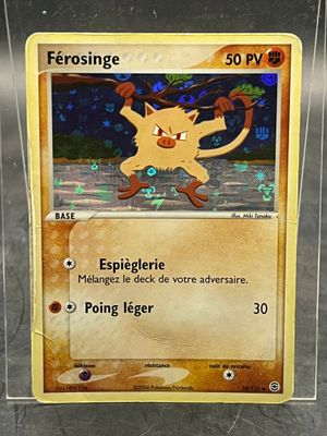 pokemon card with a picture of a pokemon character on it