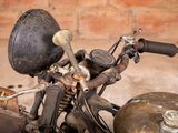 a close up of a motorcycle with a helmet on it