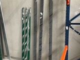 many different types of metal bars in a warehouse