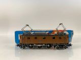a toy train that is sitting on a white surface