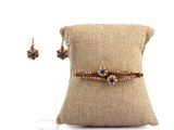 Ensemble bracelet et boucles d'oreilles en or rose 18 carats, serti de saphirs et de diamants