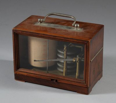 a small wooden box with a clock inside of it