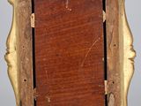 a picture of a wooden picture frame on a stand