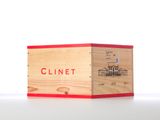 a wooden box with a red lid on a table