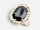 an image of a black and white diamond ring on a white background