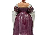figurine of a woman in a purple dress with a red apple on her head