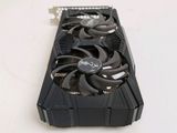 a close up of a video card with a fan on it