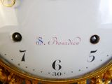 a close up of a clock with numbers on it