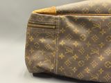 Sac à bandoulière Louis Vuitton en toile Monogram avec finitions dorées