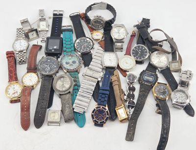 a lot of watches that are sitting on a table
