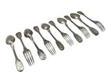 six forks are arranged in a row on a white surface