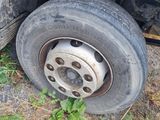 a flat tire on the side of a truck