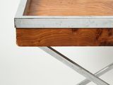 a close up of a table with a wooden tray on it