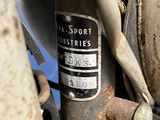 a close up of a motorcycle with a number plate on it