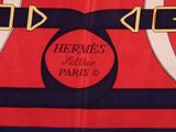 a close up of a red and blue dress with a black belt