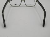 a pair of glasses sitting on top of a white surface