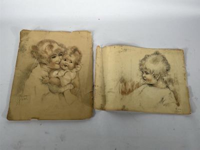 un vieux livre contenant deux dessins représentant un bébé et un ours en peluche