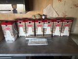 a counter with a bunch of boxes of food on top of it