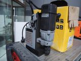 a drill that is sitting on top of a table