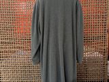 the back of a gray coat on a mannequin mannequin mannequin mannequin mannequin mannequin mannequin mannequin