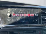 the dashboard of a car with a digital display on it