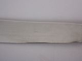 a knife that is laying on a table